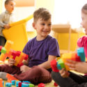 young children playing with legos and developing soft skills in early childhood