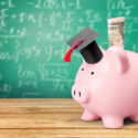 Piggy Bank with Graduation Hat and dollar banknote