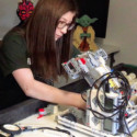 Ashlyn from LadyCans FRC Team 2881 building a LEGO version of the team's FRC robot